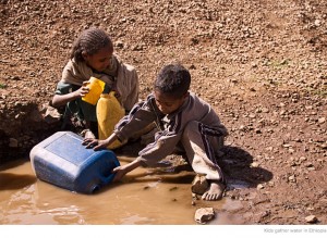 people drinking dirty water